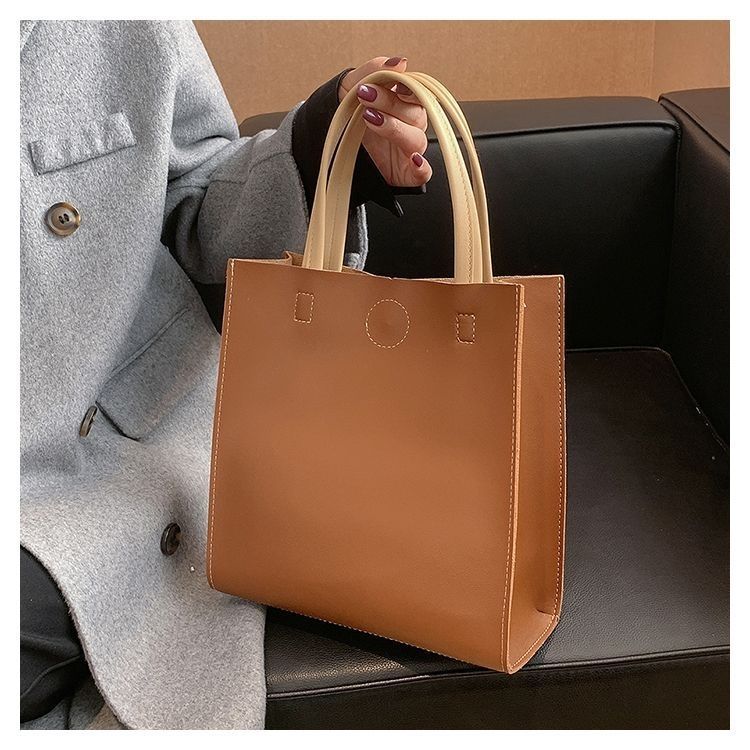 2024 New Bags Korean Version Versatile Commuting Bags Large Capacity Portable Tote Bag Temperament Popular Women’s Bag Vertical Style_voghion.com