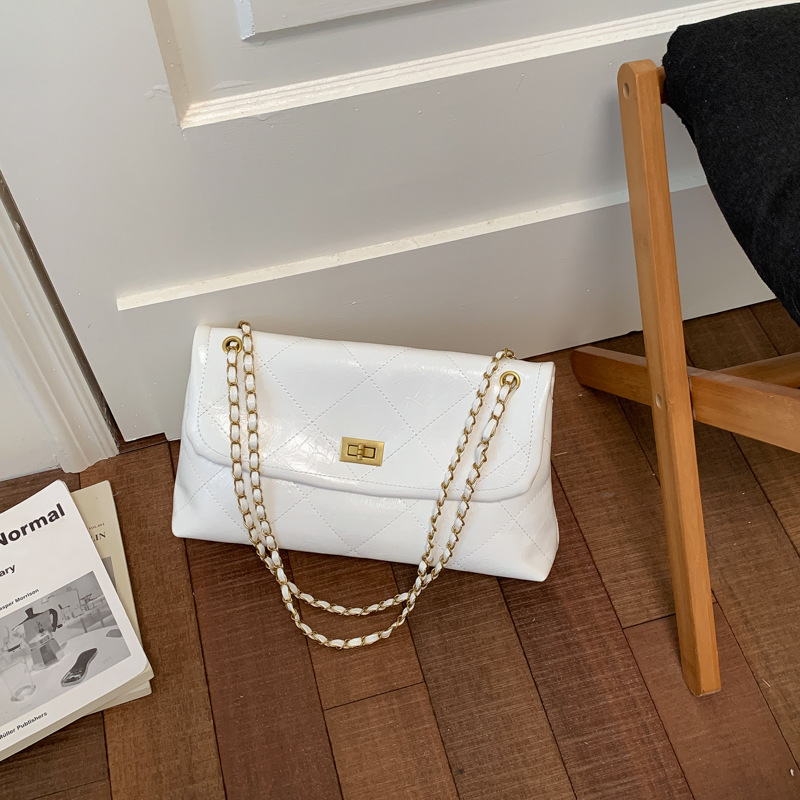 Bolso retro de gran capacidad para mujeres 2026 nueva moda cadena de diamante mochila de hombro de nicho de viaje bolsa de mano