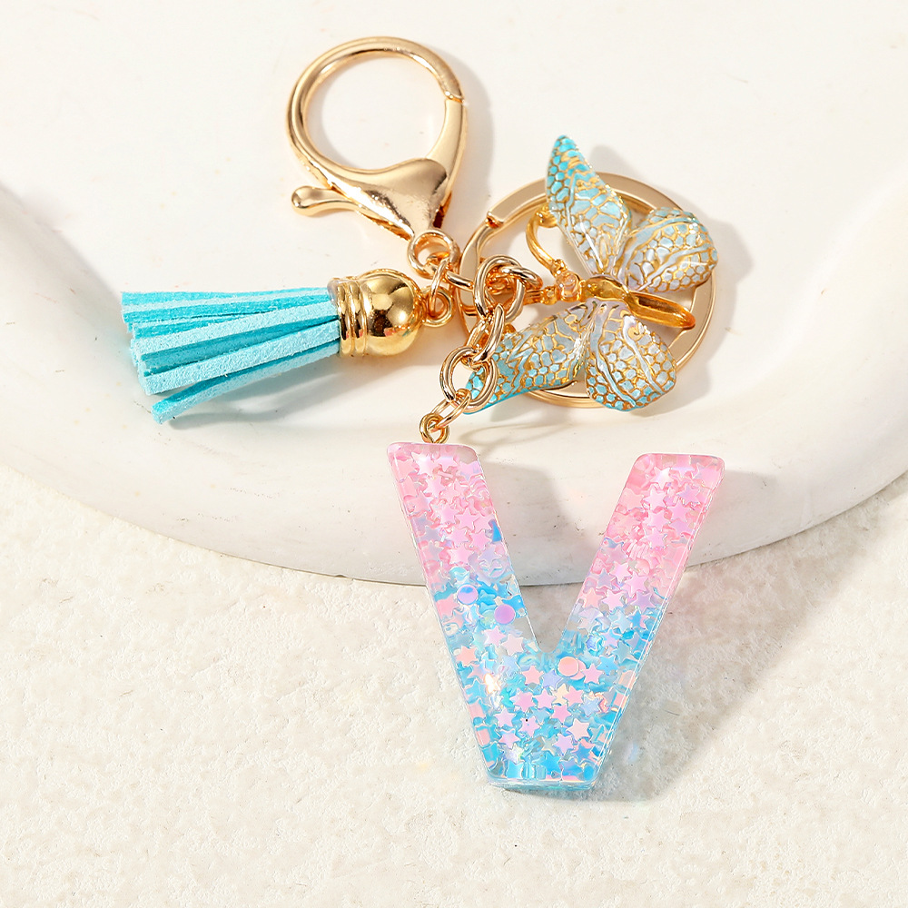 Europa y los Estados Unidos transfronterizos nuevos cristal sequinado goteo de goma letras inglesas joyería llavero y bolsos colgante apoyo al por mayor