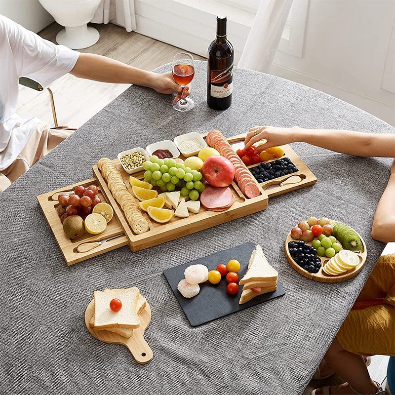 Fábrica de queso de bambú personalizado con cuchillo y tenedor pizarra multifuncional platos de verduras de fiesta de frutas snack platos