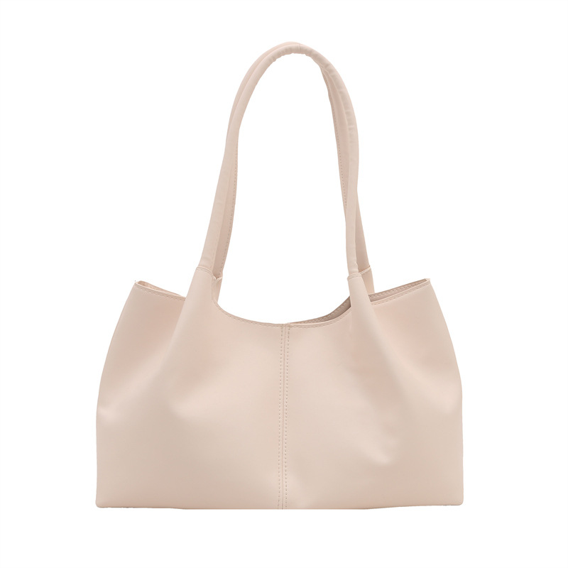 Este año, la sensación de relajación de la moda de color sólido 2024, el nuevo tipo de bolso de hombro simple de gran capacidad, bolso de mano de empalme de moda