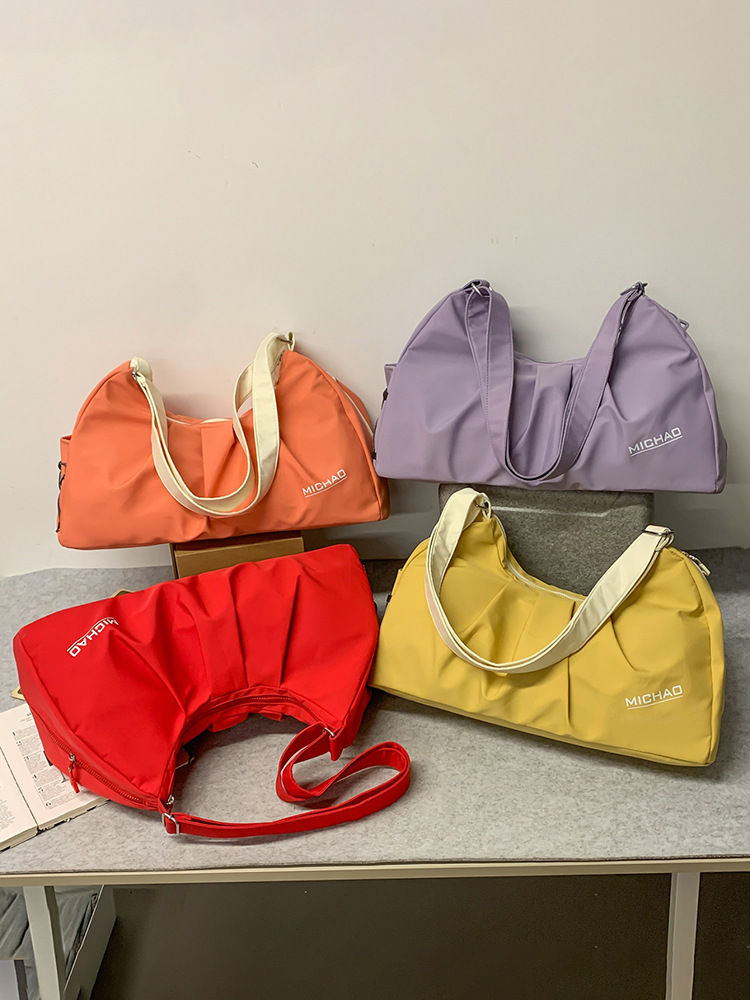 2025 nueva bolsa de equipaje para mujeres bolsa de excursión bolsa deportiva de gran capacidad bolsa de ejercicios bolsa de hombro ligera bolsa al por mayor