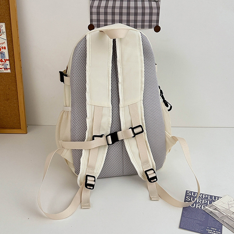 2024 mochila escolar para estudiantes universitarios nueva mochila simple de gran capacidad ocio al aire libre mochila ligera de secundaria al por mayor