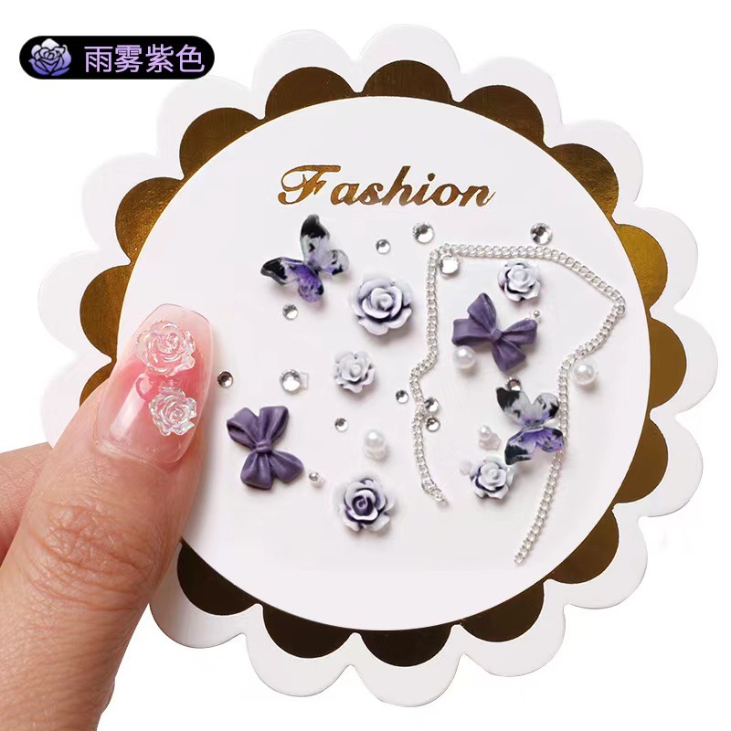 Manicure camellia material paquete de joyería pequeño libro rojo explosión arco mezcla de cadena de joyería de uñas accesorios al por mayor