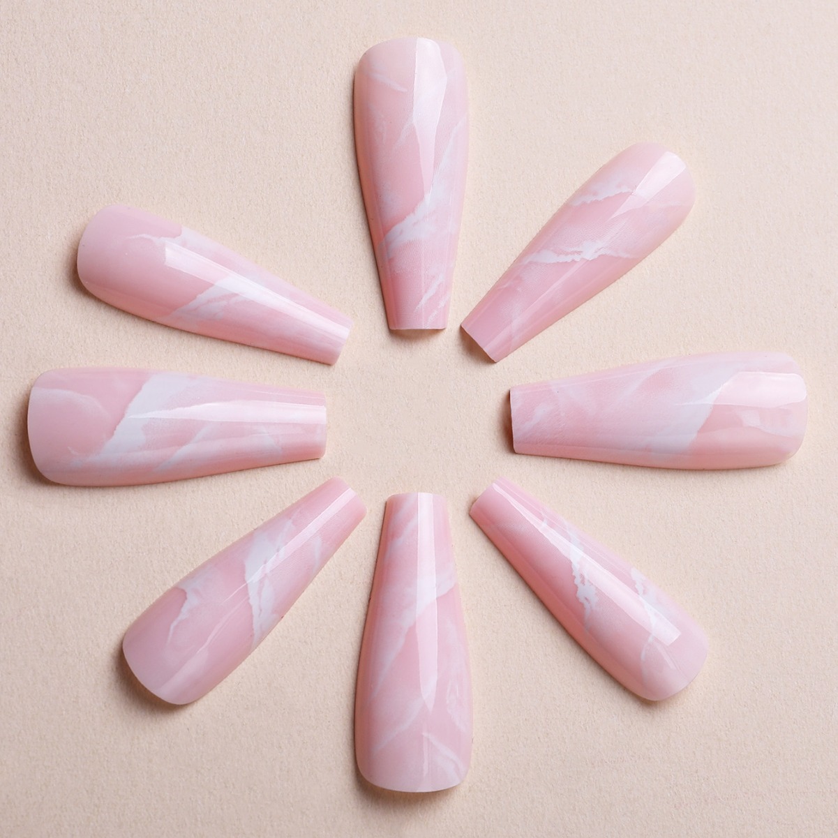 Millones de puntos venta directa patrón de mármol transfronterizo armadura portátil rosa manicura falsa armadura portátil desmontable de longitud media