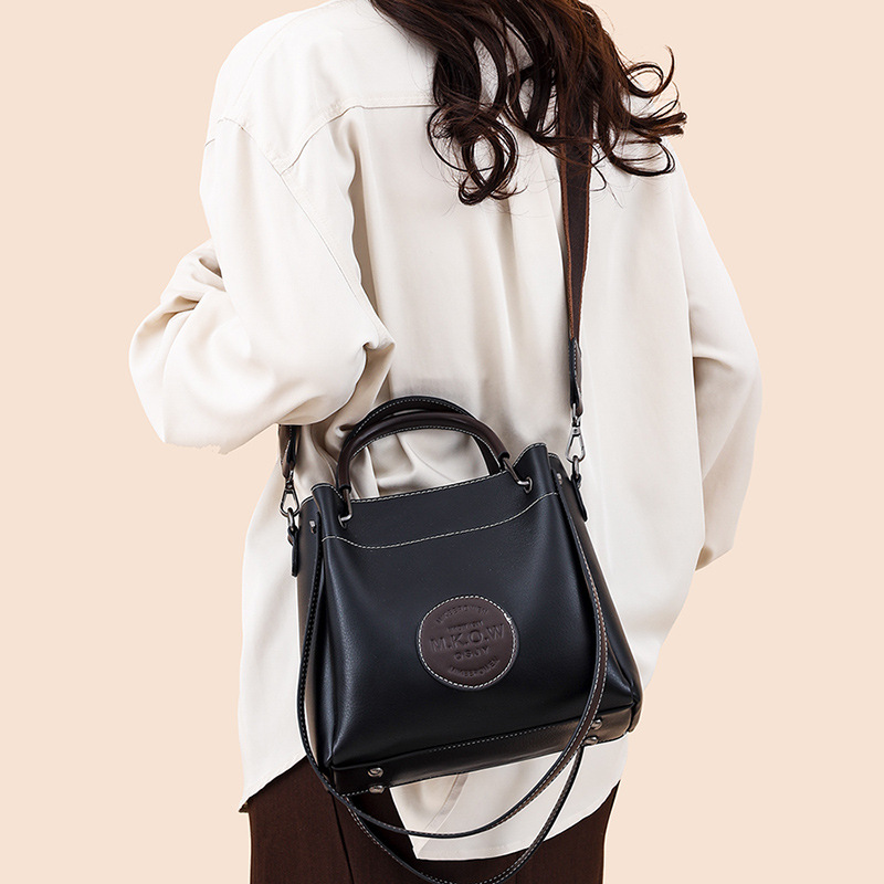 Bolso de hombro de cuero suave transfronterizo bolso de mujer 2024 nuevo sentido de alta calidad versátil de transporte de gran capacidad bolso de cubo de transporte