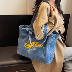新しいデニムの刺繍のアルファベットの3色の起爆金は片肩の韓国版を持って学生の補習の袋を包みます。