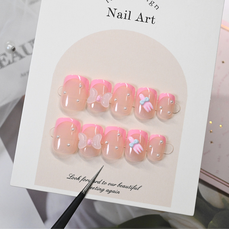 24 Pieces of Pink Short French-Style Nail Tips with Bowknot, Small Fork, and Pearl Decorations, Sweet and Cute Nail Tips