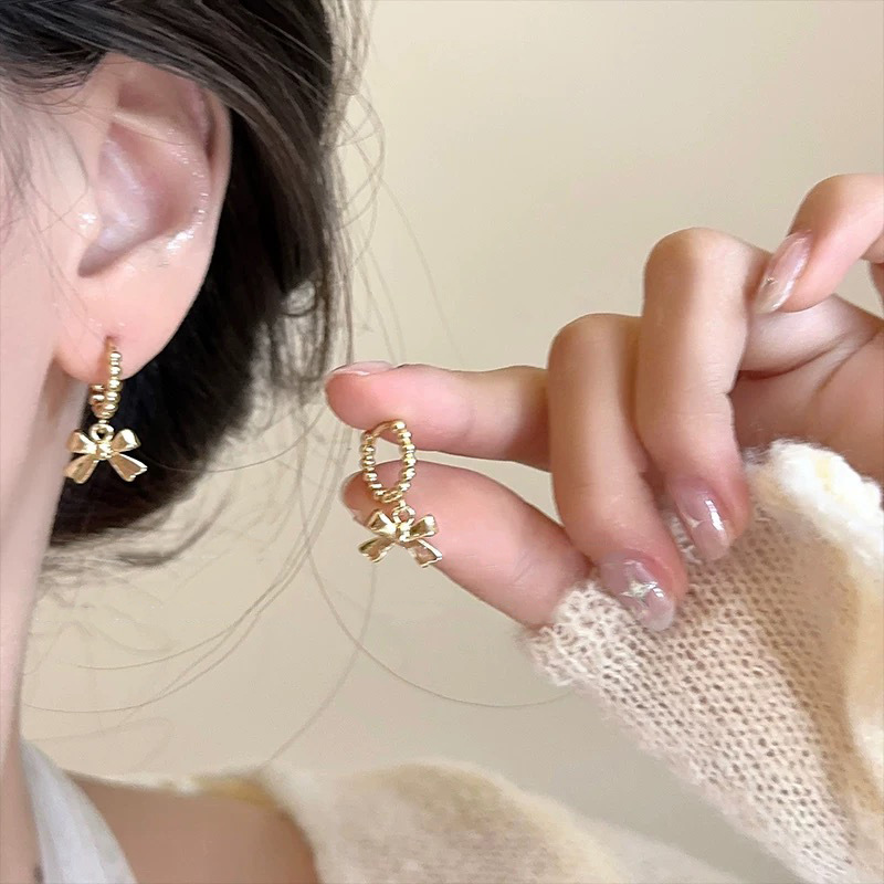 Pendientes de metal de alta gama, diseño minimalista y moderno, para mujer 2024, suministro al por mayor