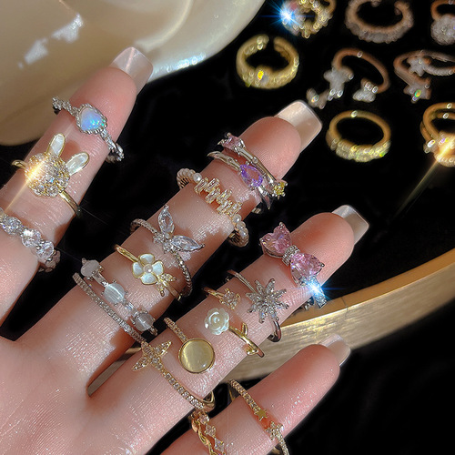 Korean-style zirconia ring for women, simple open-mouth pearl finger ring with adjustable fashion and personalized hand jewelry for wholesale.