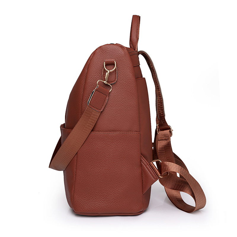 Spot al por mayor 2023 nueva mochila de cuero suave para mujer casual simple y versátil mochila de viaje de gran capacidad