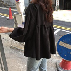 早秋の春と秋の甘さの灯籠の袖のシャツの韓国版の薄い長袖の子供のシャツの女性はゆったりとしていて腹の上着を隠します。