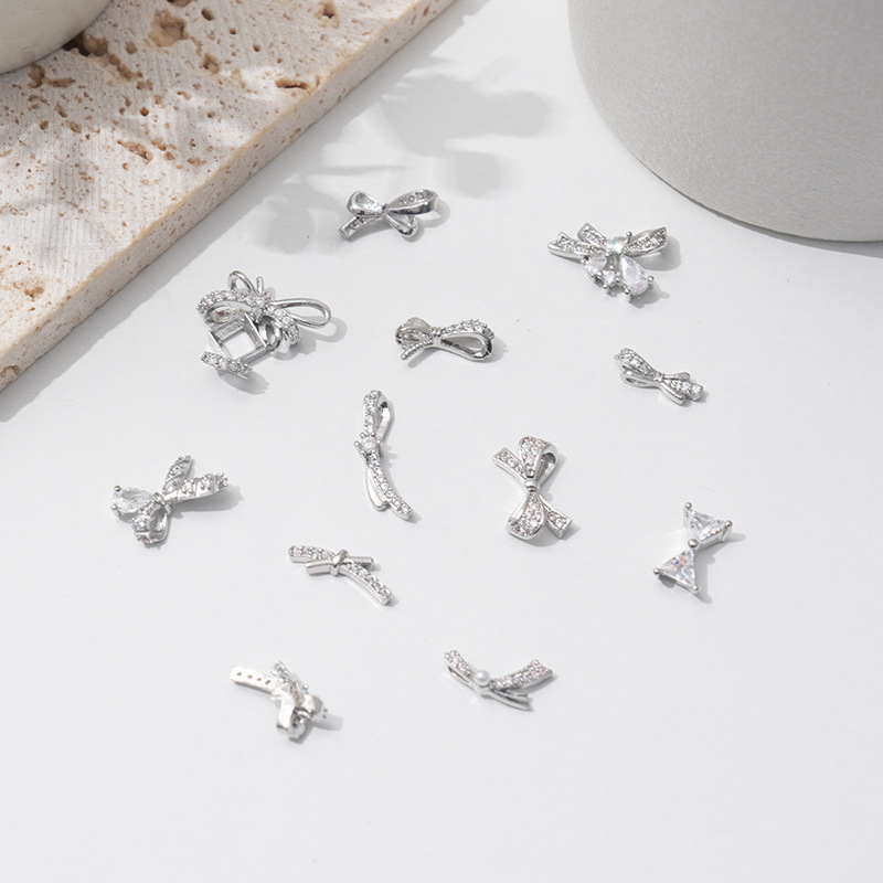 Lz Manicure Jewelry Alloy Zirconium Simple Explosive Nails Color-Preserving Bow Pile Diamond Ball Wearable Accessories Factory Diamond Jewelry Lz Manicure Jewelry Alloy Zirconium Simple Explosive Nails Color-Preserving Bow Pile Diamond Ball Wearable Accessories Factory Diamond Jewelry