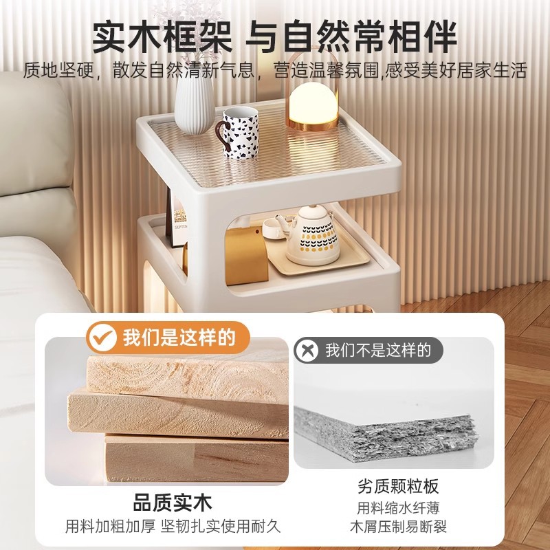 Sofá de lado unos pocos modernos y simples sala de estar casera pequeña mesa de té creativa cama de aire crema estante de cabecera