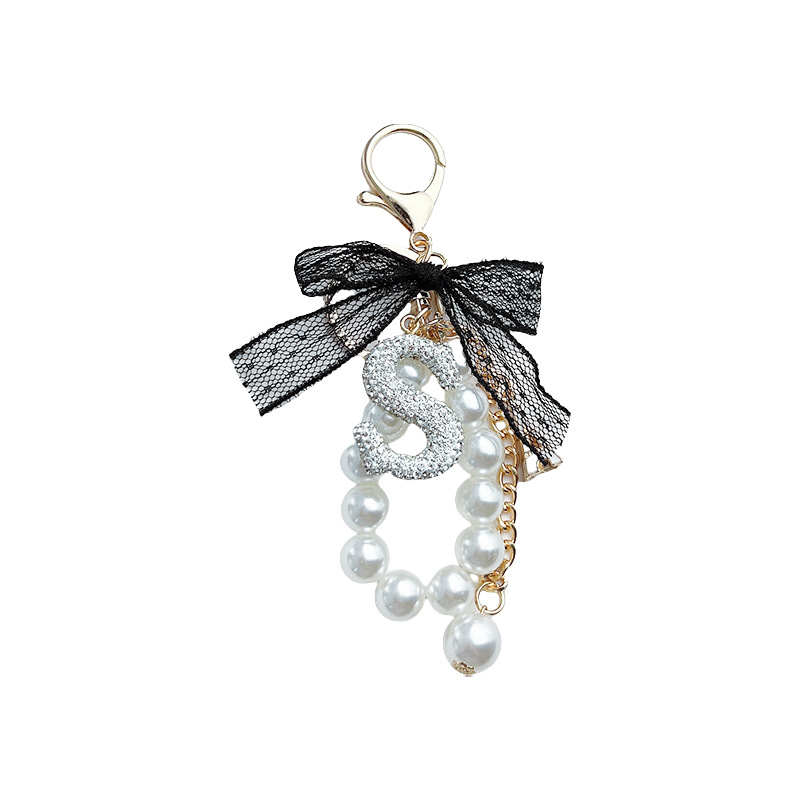 Arco de encaje de cerámica de arcilla letras llavero de perlas creativo colgante de llaves de automóvil de diamante completo colgante de bolsa