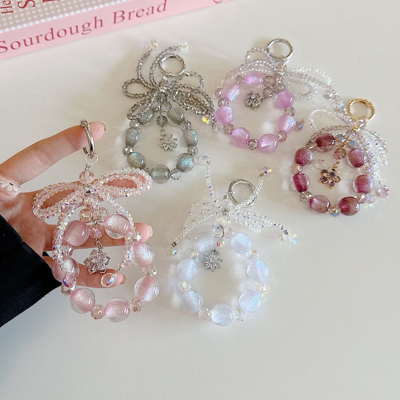 Boutique hecho a mano de alta gama para teléfono móvil cadena femenina ins linda cadena de cuentas de vidrio cordón de teléfono móvil de moda colgante de mensajero largo