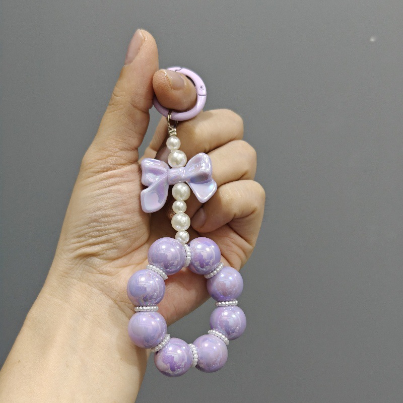 Nueva electrochapado cuentas arco llavero del coche colgante lindo caramelo color pintura anillo de perlas accesorios bolsa Decoración