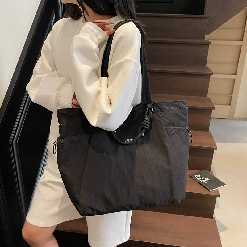 Bolsa de viaje de nylon lavable de gran capacidad nueva moda ocio universal bolsa de hombro de mujer
