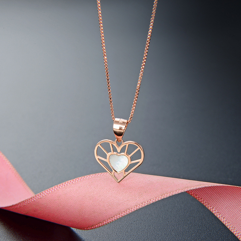 Simple Hollow Heart-shaped Fashion Accessories Pendant S925 Silver Pendant display picture 2