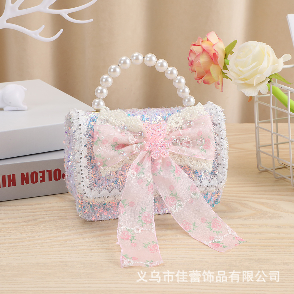 Bolsos para niñas, modernos bolsos cruzados estilo Chanel para niñas pequeñas, elegantes bolsos con lazo de perlas para niñas pequeñas, impermeables.