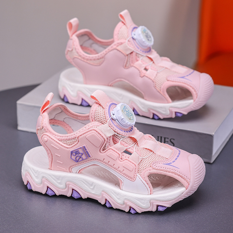 Sandalias para niñas Verano 2025 Sandalias antideslizantes de malla para niños Zapatos de playa Baotou Botón giratorio Sandalias para niños