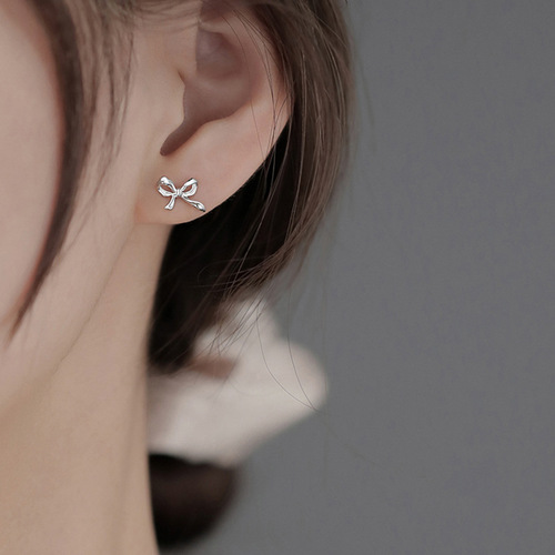 Bow tie earrings for women  trendy simple cold style internet celebrity niche design hollow earrings