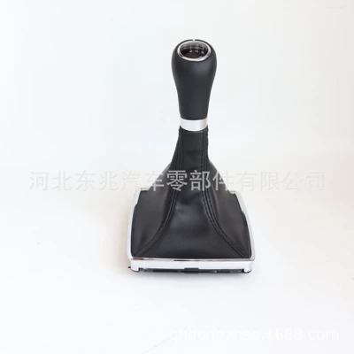 Cab and accessories dust cover integrated shift handball