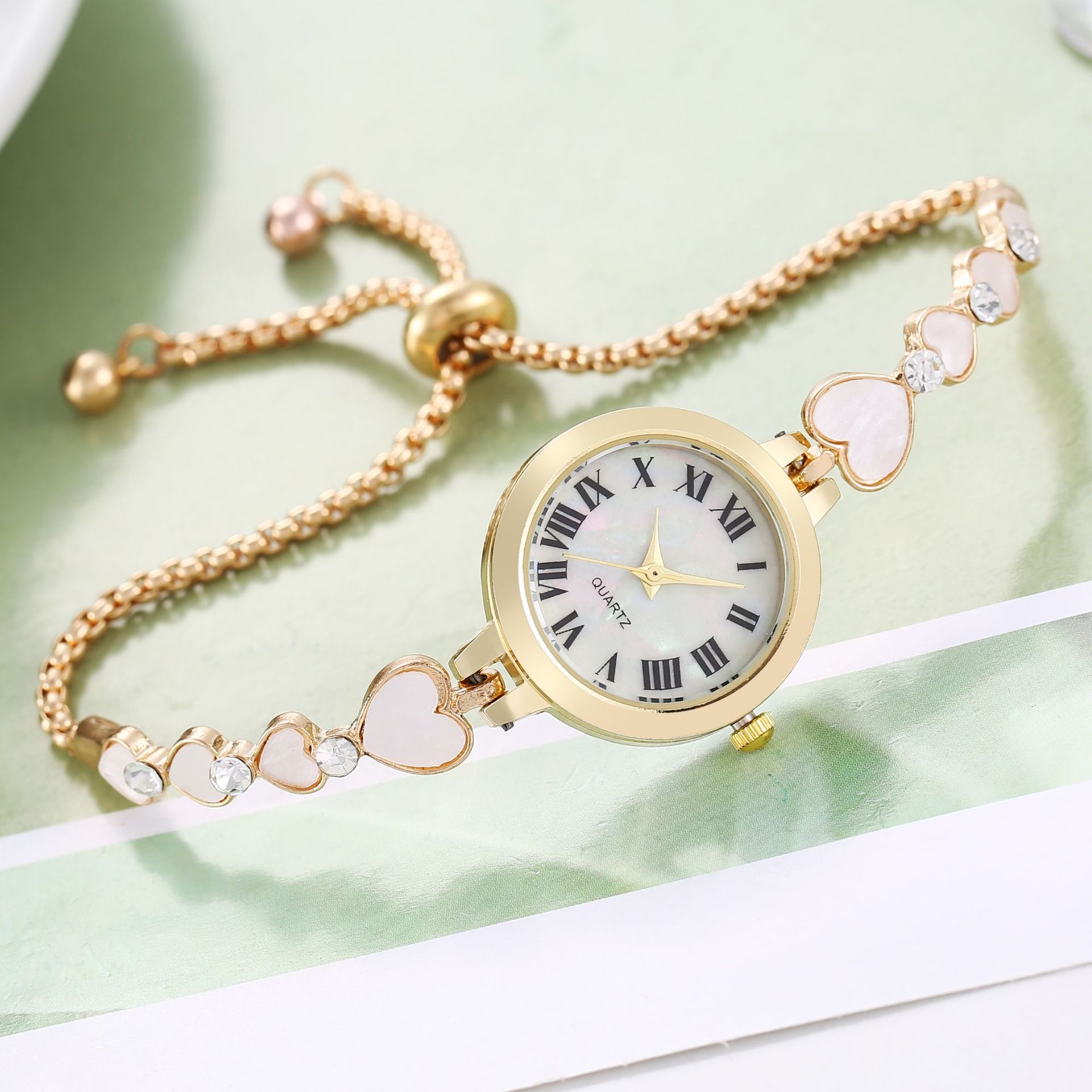Mujeres con corazón pulsera reloj rhinestone Shell pequeño dial pulsera reloj retráctil ajustable reloj