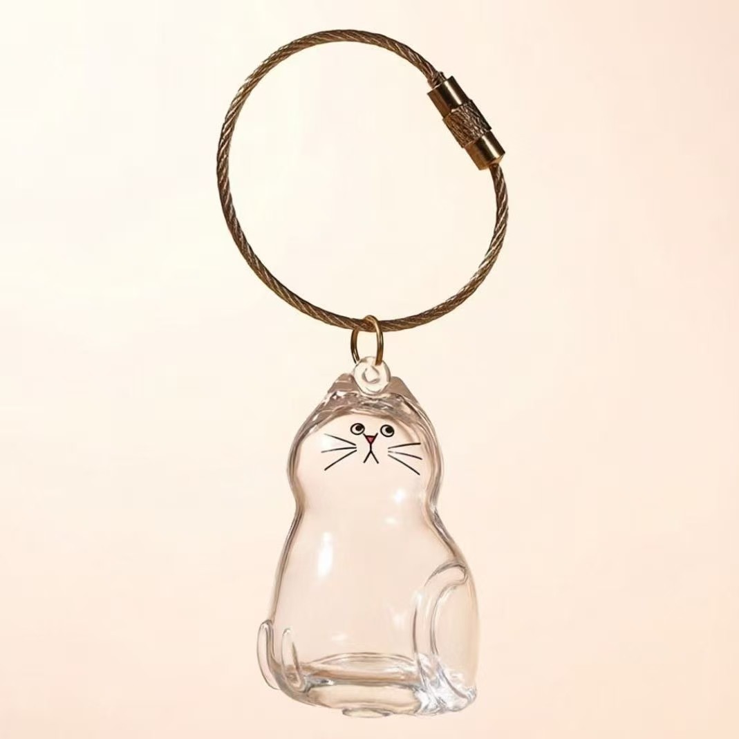 Caja de almacenamiento para perros y gatos colgantes de pelo transparente colección de almacenamiento cápsula bolsa colgantes de llaver