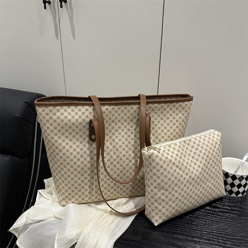 2025 primavera nueva moda moda de gran capacidad bolsa de viaje bolsa de hombro portátil bolsa de dos piezas simple