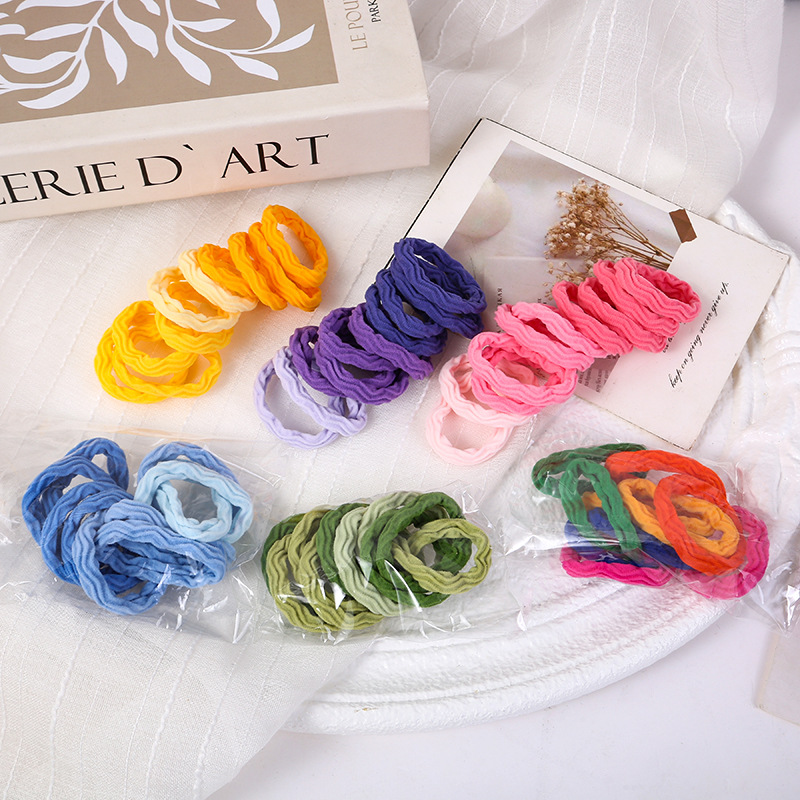 Explosiones clásicas super asequibles 10 colores anillo de cabello grueso de alta elasticidad sin costuras toalla jacquard anillo de goma cubierta de cuero
