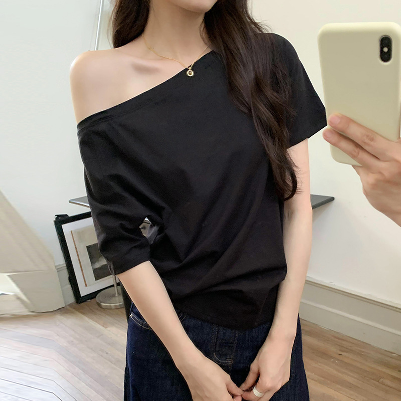 スターの同じタイプの斜め肩の半袖の女性の肩のtシャツの夏の純粋な欲のギャルのゆったりしている黒色の1字の肩の上着