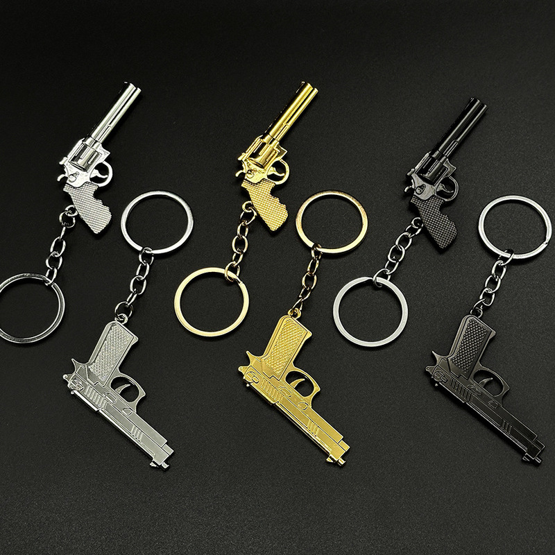 high quality cross-border mini metal pistol keychain pendant eating chicken peripheral simulation model gun keychain wholesale