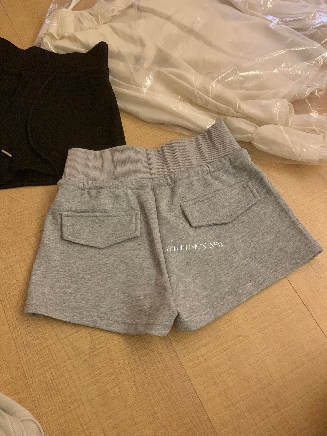 Quần short thể thao nữ cạp cao rút dây dáng suông — màu đen, màu hồng, xám nhạt, màu trắng chi tiết 14