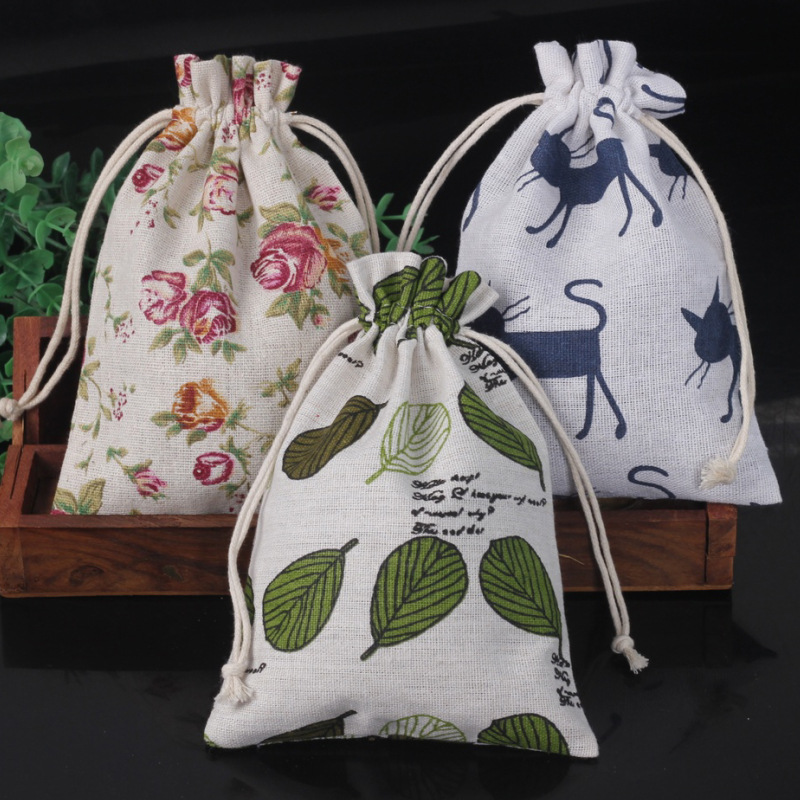 Ventas calientes de impresión de paquetes de cuerda de dibujo bolsas de impresión logotipo de lino bolsa de tela para el medio ambiente bolsa de almacenamiento de artículos 13 * 18