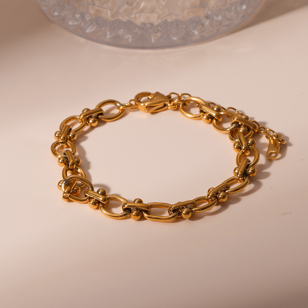 Estilo frío retro francés acero inoxidable horno de 18K galvanoplastia de oro real en forma de O lunares hechos a mano collar de clavícula femenino