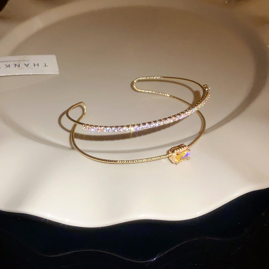 ジルコンの花の十字の二重の開口の腕輪の軽くて豪華な高級感の手環のファッションのinsの百合の手飾りの卸売り