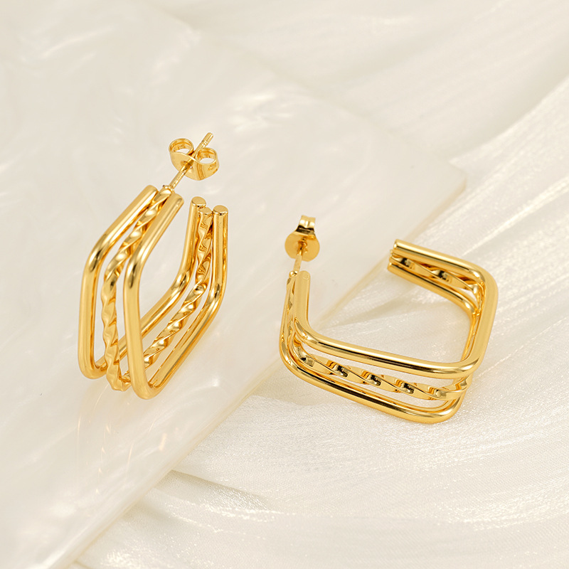 Pendientes de acero inoxidable multicapa europeos y americanos transfronterizos Pendientes de acero de titanio cuadrado geométrico chapado en oro de temperamento simple femenino