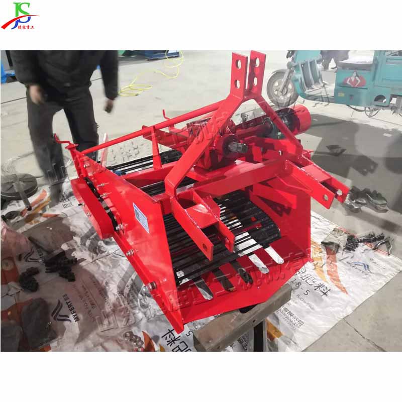 土壤筛石自动装车机 液压田间管理捡石机 拖拉机牵引式石头清理机