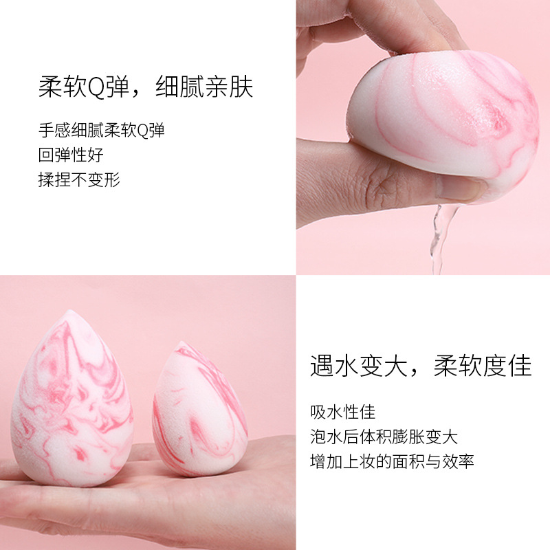Huevo de belleza de dos colores húmedo y seco de doble uso maquillaje gota de agua soplo de polvo hidrófilo sin látex esponja remojo agua se convierte en huevo de maquillaje más grande