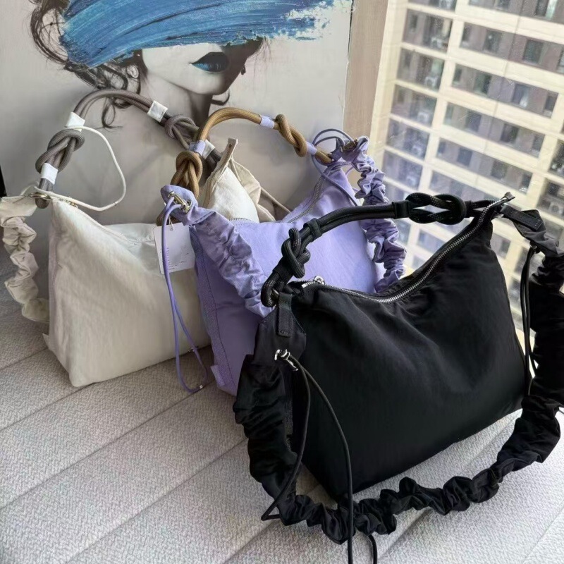 Lulu's New 6.5L Underarm Bag with Drawstring and Pleated Design, Large Capacity Crossbody Bag, Fashionable Commuter Dumpling Bag Lulu's New 6.5L Underarm Bag with Drawstring and Pleated Design, Large Capacity Crossbody Bag, Fashionable Commuter Dumpling Bag