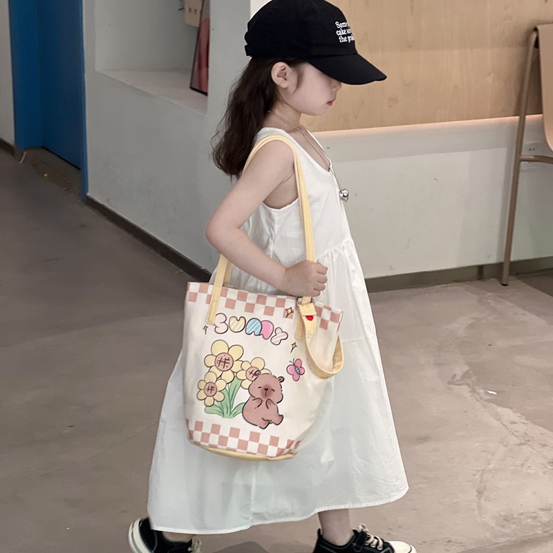 Mochila de hombro para niños y niñas de gran capacidad, nueva bolsa de impresión de aire extranjero para niños