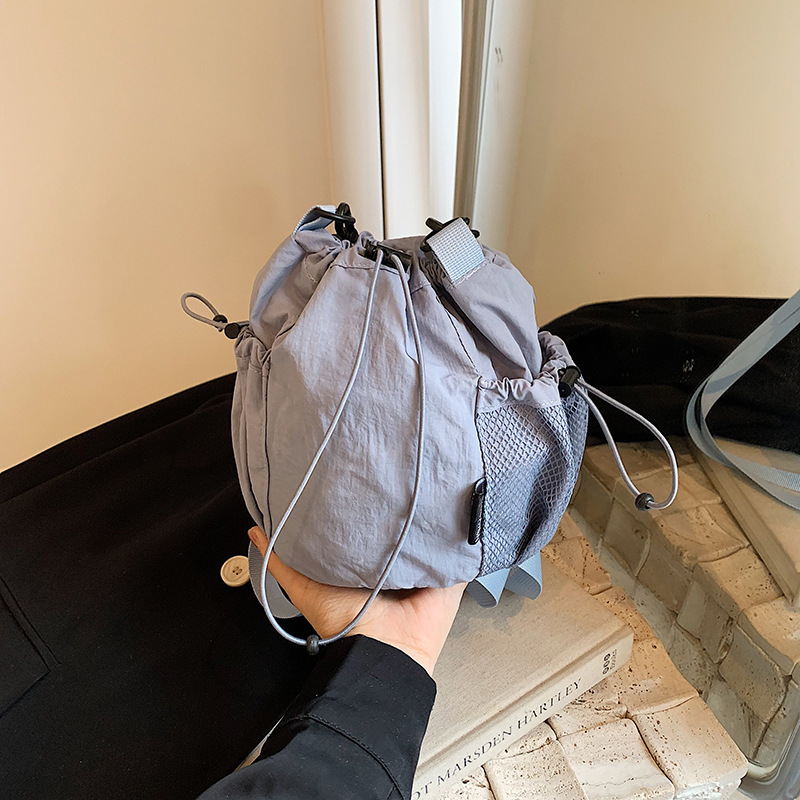 New shoulder bag ins nylon bucket bag for women with high-end feel, large capacity casual drawstring shoulder bag_voghion.com