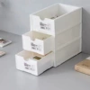 3 white drawers