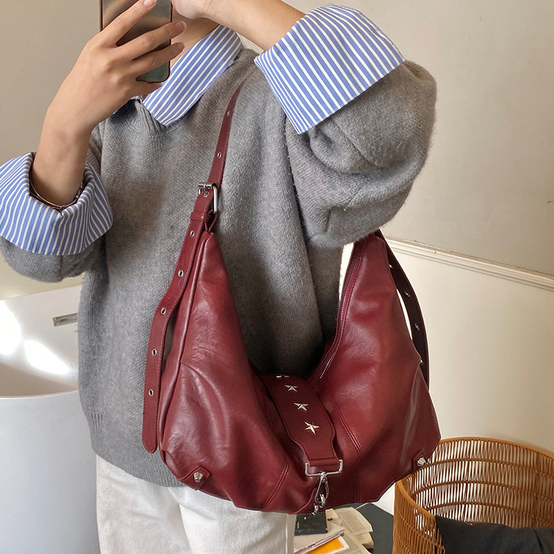 Bolsas de bolsillo transfronterizas para mujeres otoño-invierno 2025 nuevo ocio versátil bolsas de hombro de brazo de gran capacidad retro mochila
