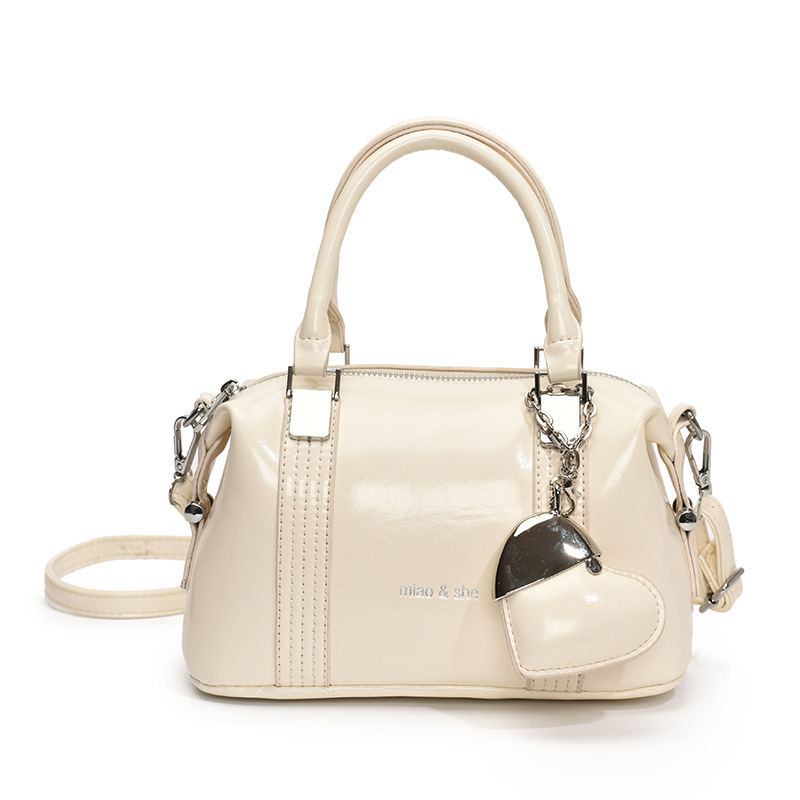 Transfronterizo de alto nivel sensación de viaje bolso de mano para mujeres 2025 nuevo estilo de moda universal bolso de hombro simple mochila casual