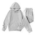 Light gray suit, white label