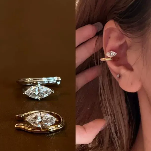 Minimalist, understated, light-luxury design with gold marquise zirconia ear cuffs, high-end fashion and elegant stud earrings