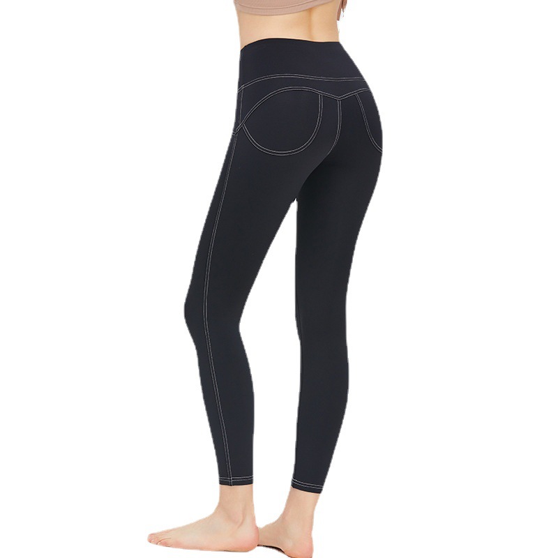 Nueva ropa de Yoga de las mujeres de Bolsillo falso elástico de la cadera melocotón pantalones de alta elástica Pantalones deportivos desnuda sensación sin T-line pantalones de yoga