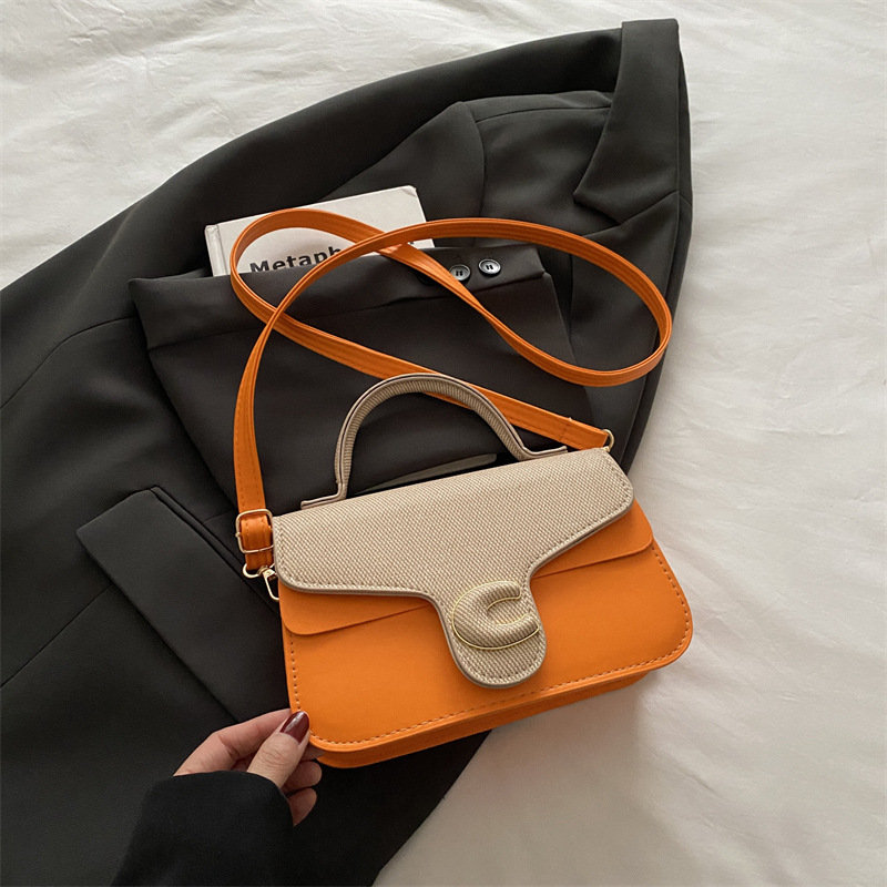Trendy de verano 2025 nuevo bolso cuadrado pequeño de color en contraste bolso de moda bolso diagonal portátil de textura occidental de todo fósforo para mujer
